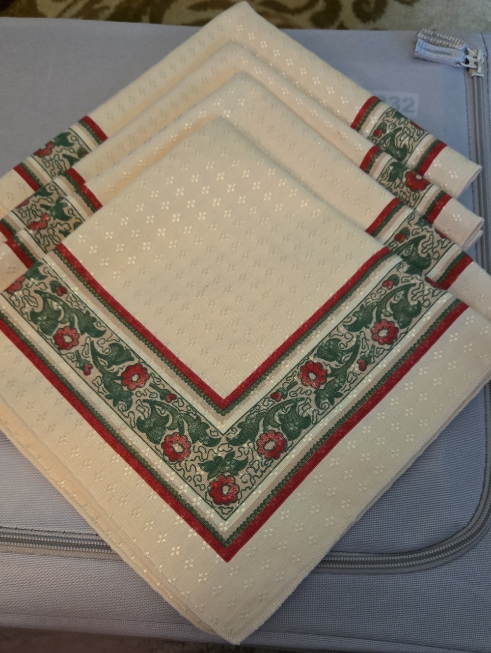 Classic Cream Colored Napkins with Red and Green Floral Border